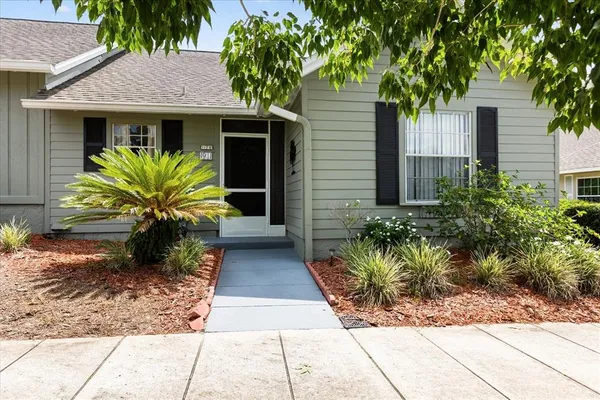 a front view of house with yard