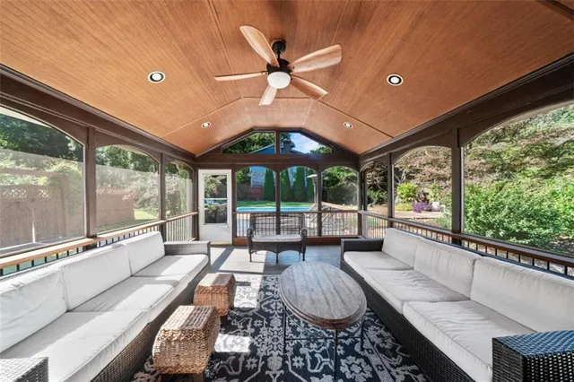 a living room with large windows