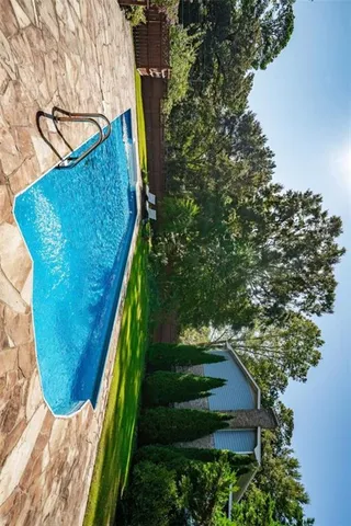 a view of wooden fence and plants