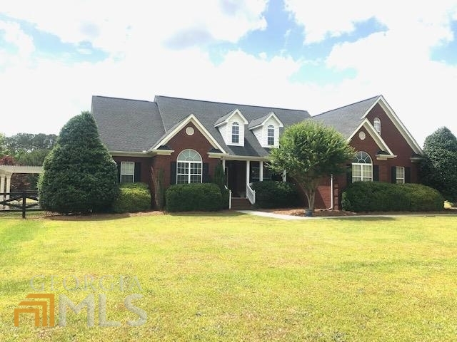 1641 Concord Road Concord, GA 30206 - Photo 1 of 1 a front view of a house with a yard