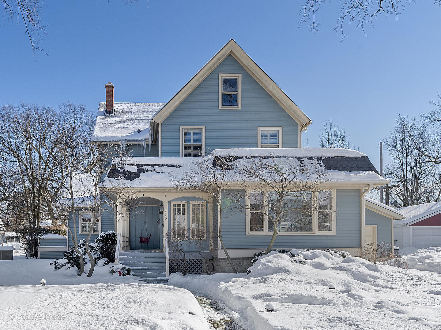 213 Woodside Road Riverside, IL 60546 - Photo 1 of 35 a front view of a house with a yard