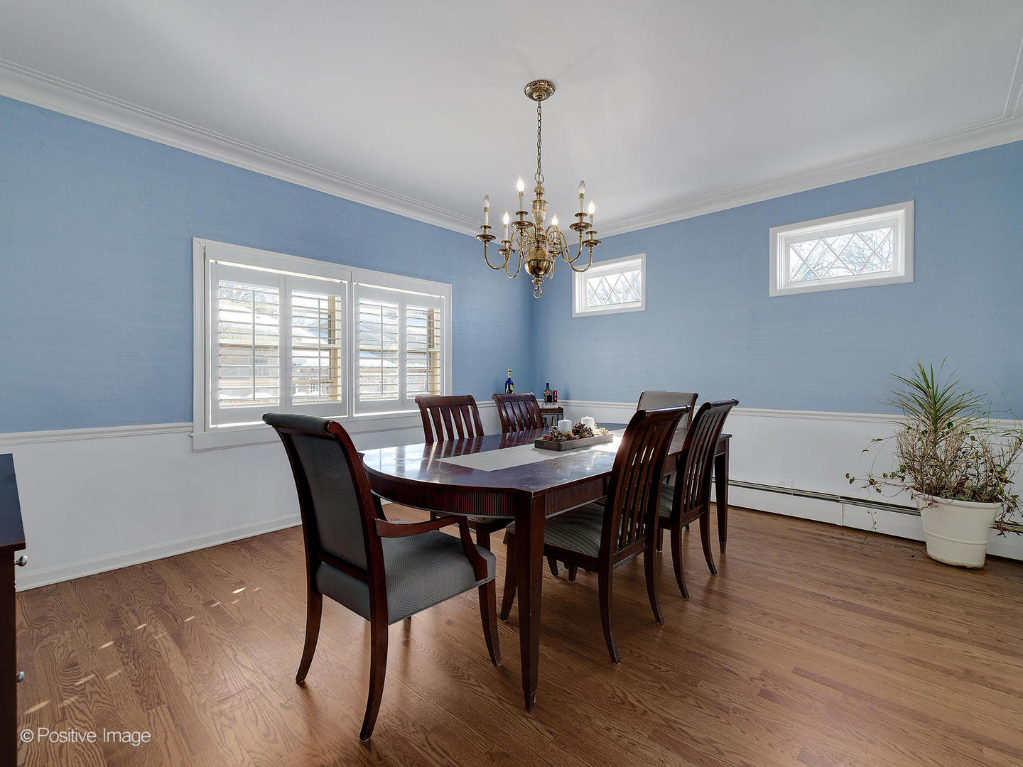 213 Woodside Road Riverside, IL 60546 - Photo 11 of 35 a view of a dining room with furniture and wooden floor