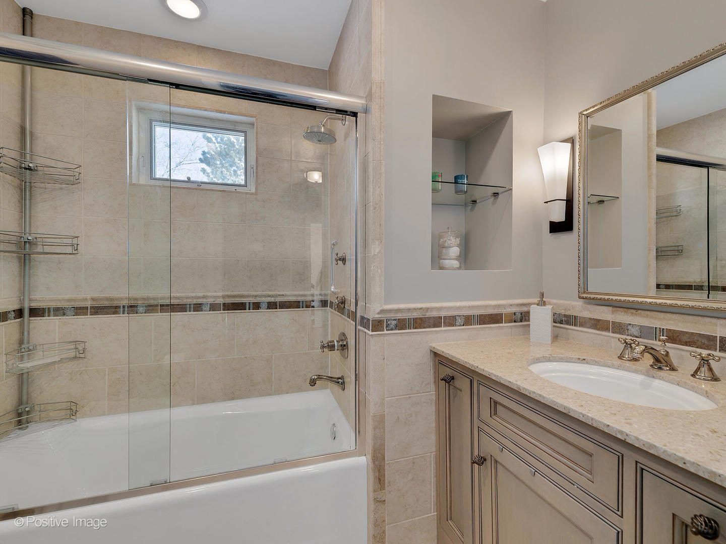 213 Woodside Road Riverside, IL 60546 - Photo 25 of 35 a bathroom with a granite countertop sink mirror bathtub and shower