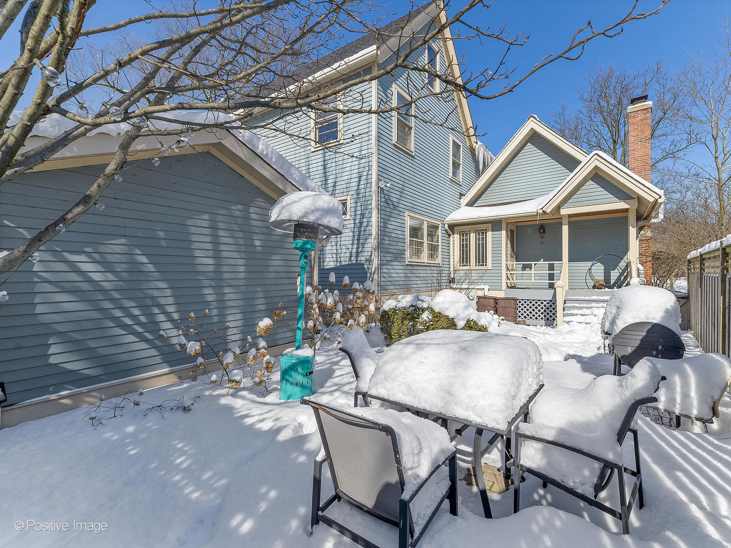 213 Woodside Road Riverside, IL 60546 - Photo 29 of 35 a view of a patio with table and chairs and potted plants