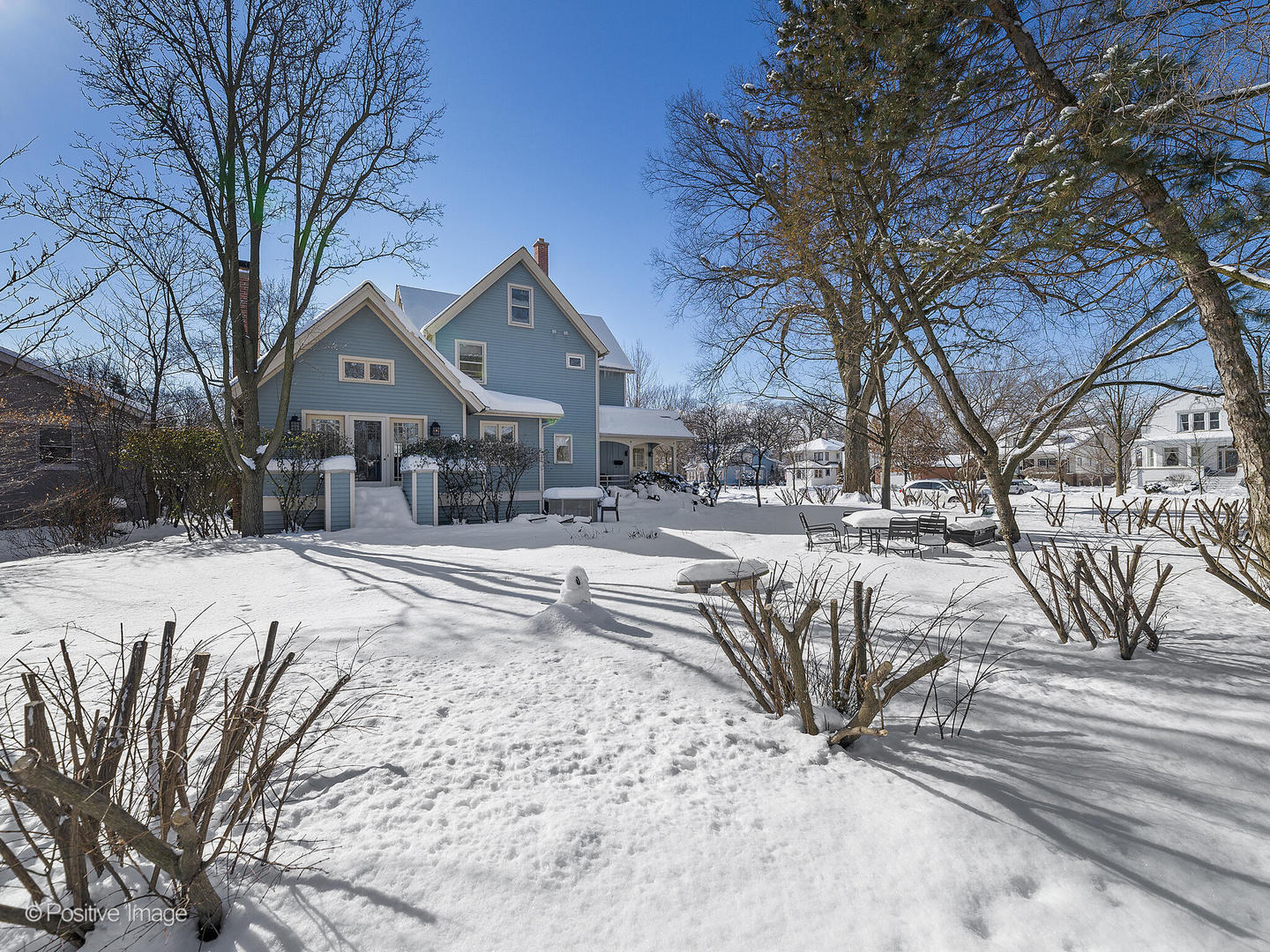 213 Woodside Road Riverside, IL 60546 - Photo 31 of 35 a view of a house with snow on the road