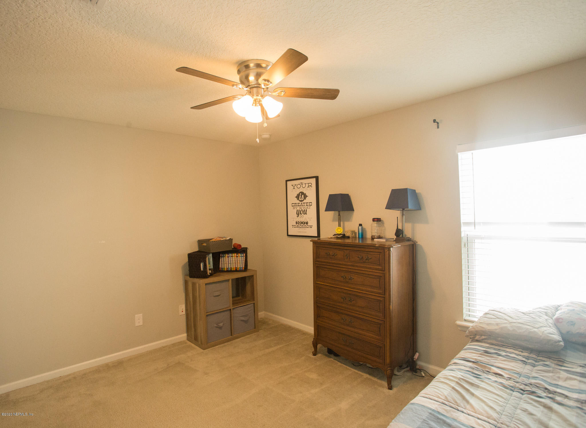 92 Bluejack Lane St. Augustine, FL 32095 - Photo 17 of 44 a view of a bedroom with closet and cabinet