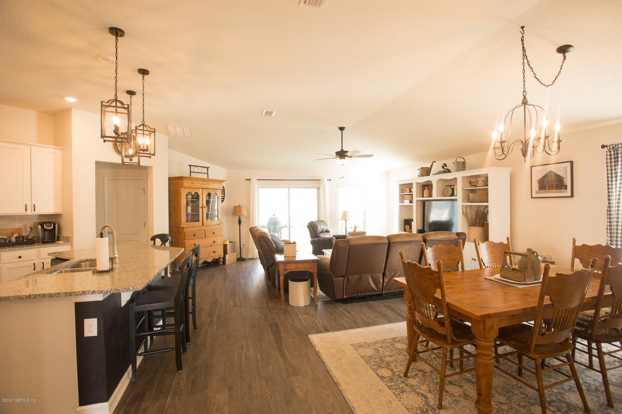 92 Bluejack Lane St. Augustine, FL 32095 - Photo 19 of 44 a view of a dining room with furniture
