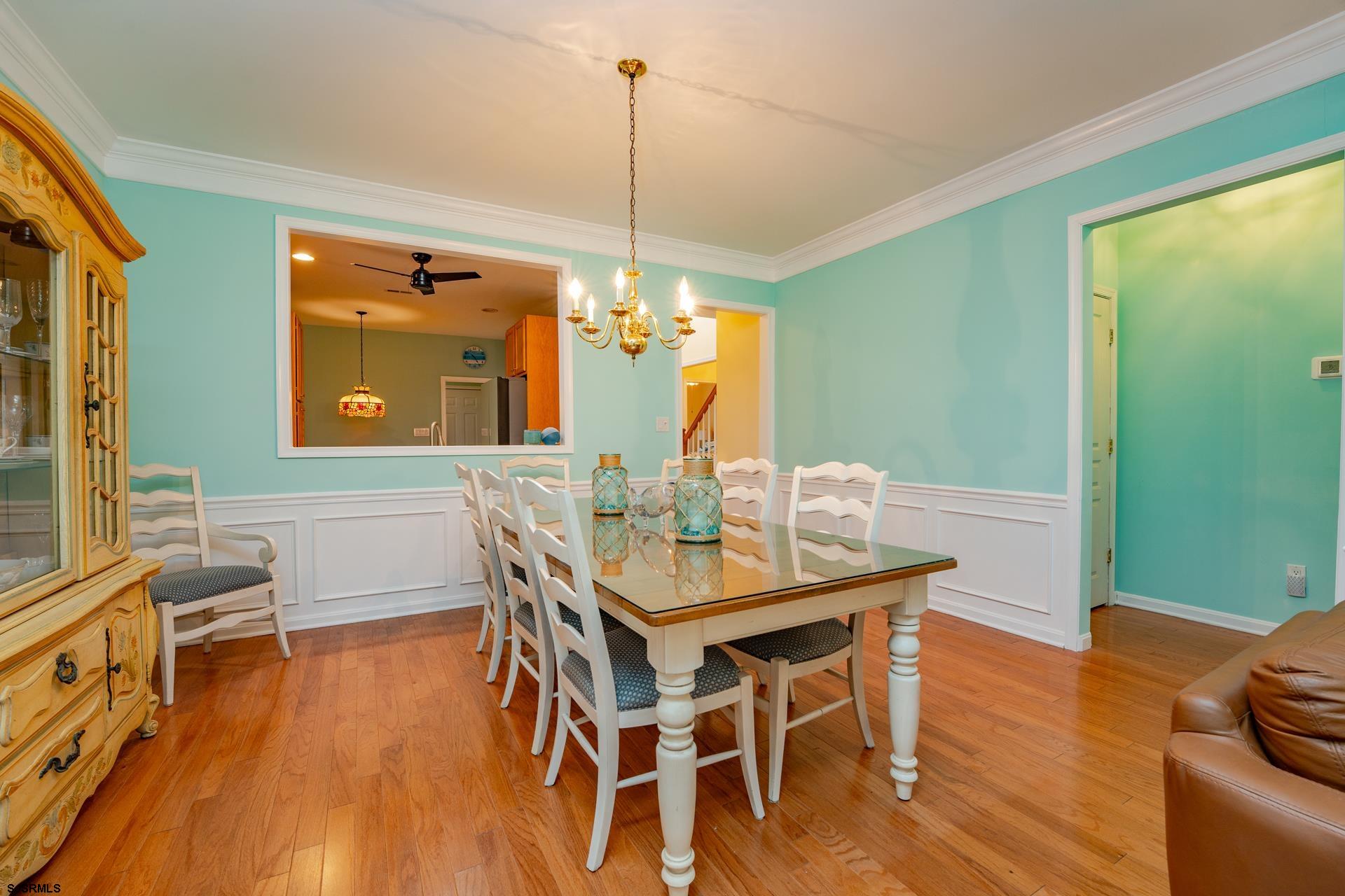 1731 Highway 9, Unit 28 Ocean View, NJ 08230 - Photo 13 of 41 a view of a dining room with furniture window and wooden floor