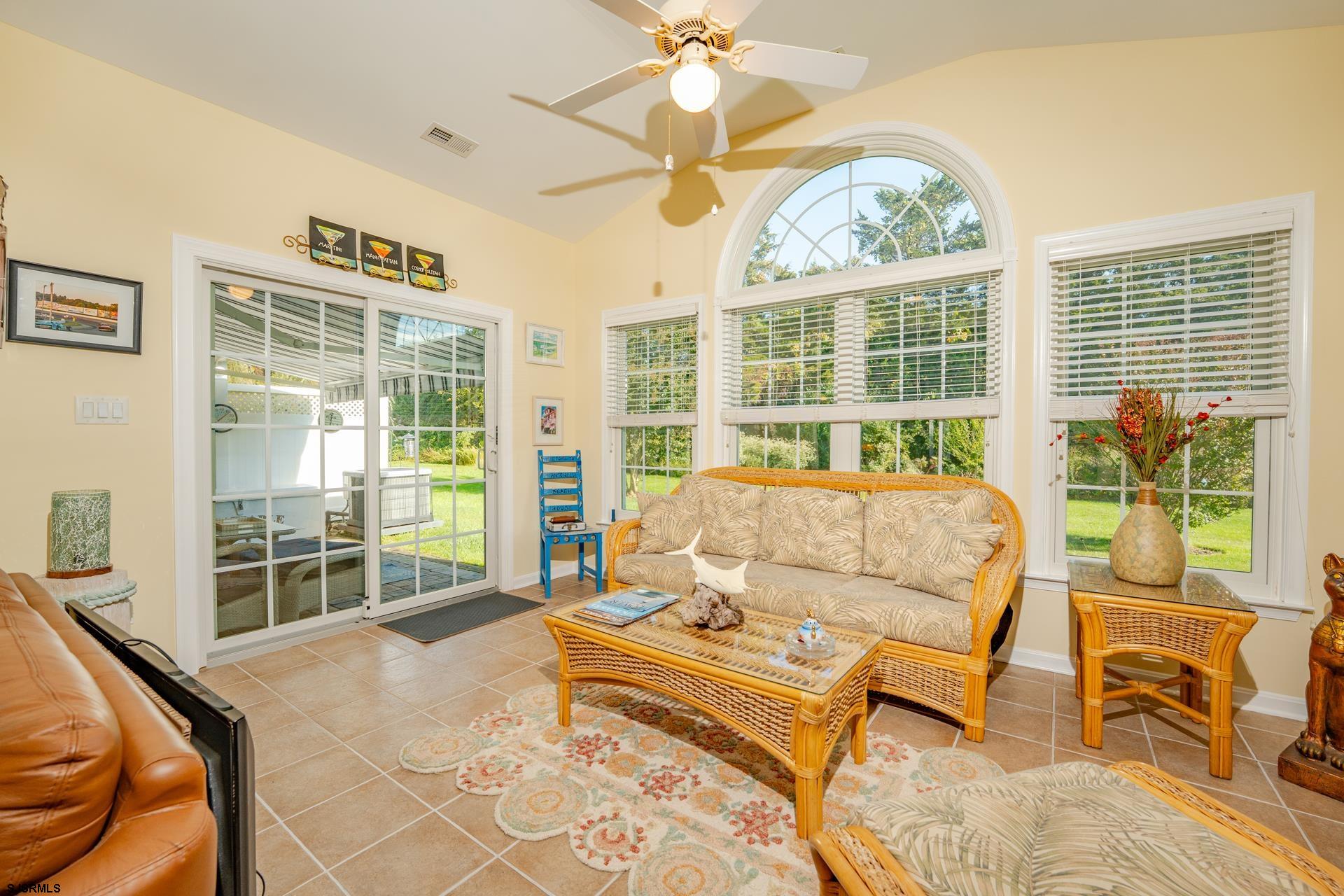 1731 Highway 9, Unit 28 Ocean View, NJ 08230 - Photo 14 of 41 a living room with furniture and a large window