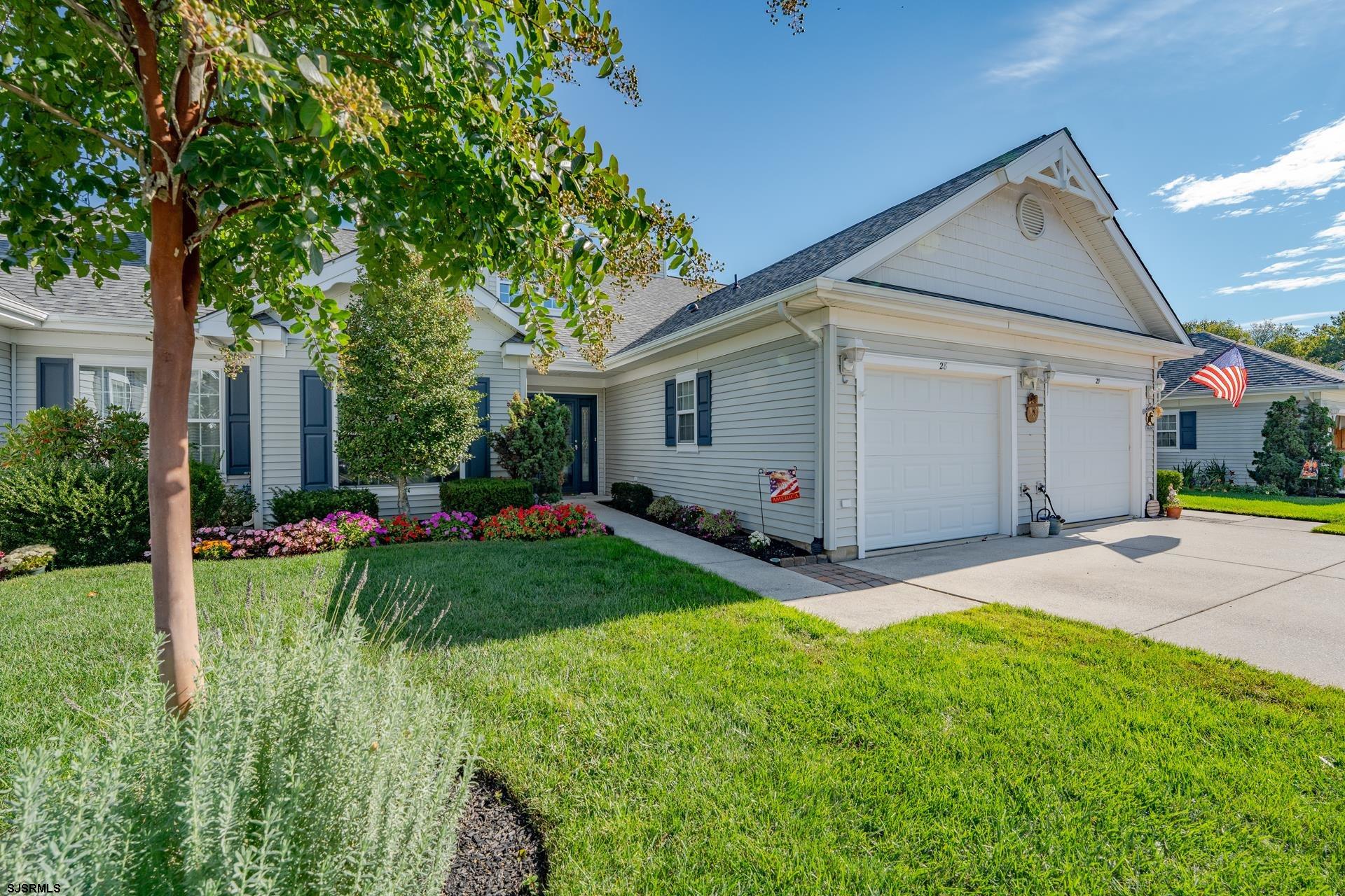 1731 Highway 9, Unit 28 Ocean View, NJ 08230 - Photo 2 of 41 a view of a house with backyard and garden