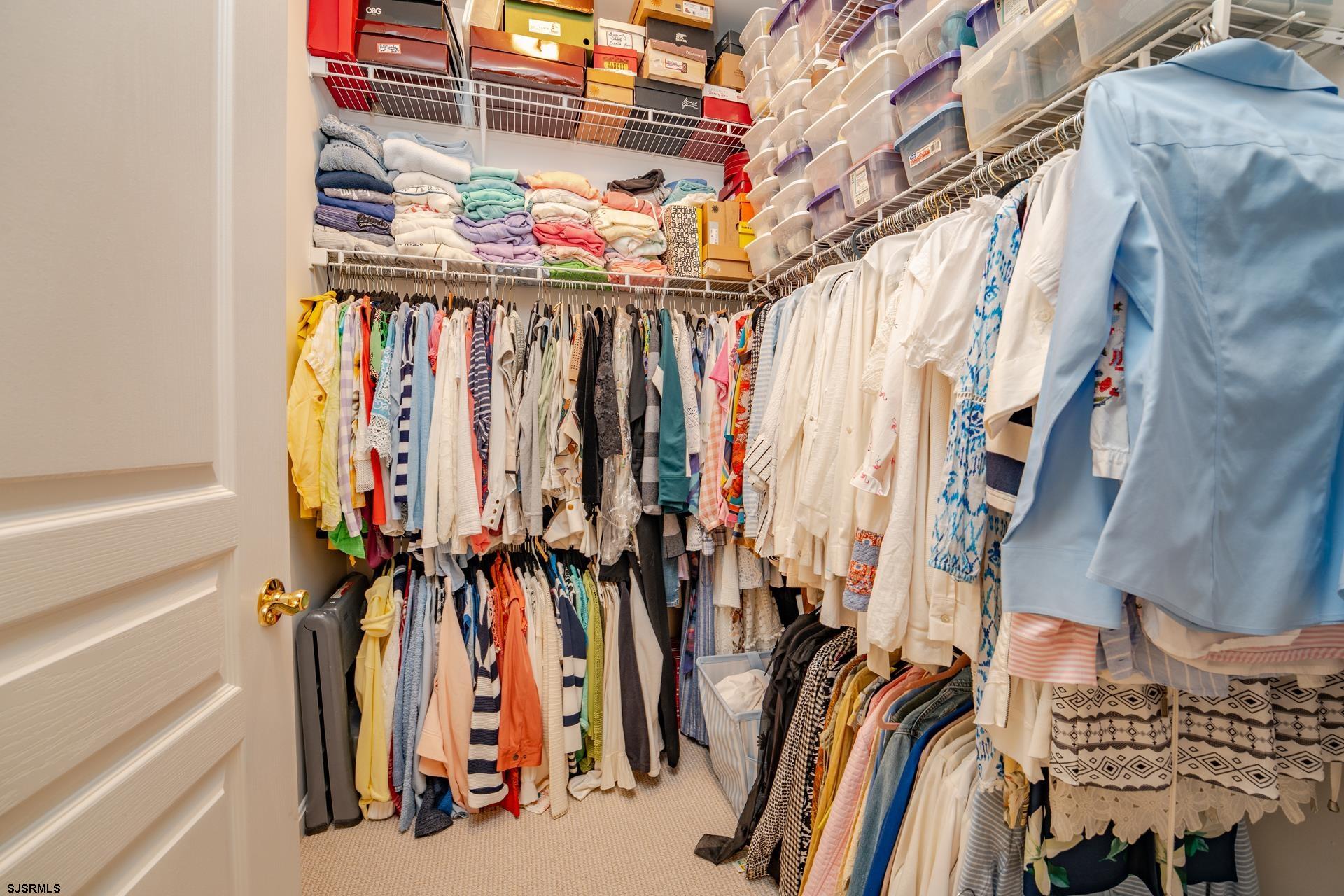 1731 Highway 9, Unit 28 Ocean View, NJ 08230 - Photo 23 of 41 a view of walk in closet with clothes