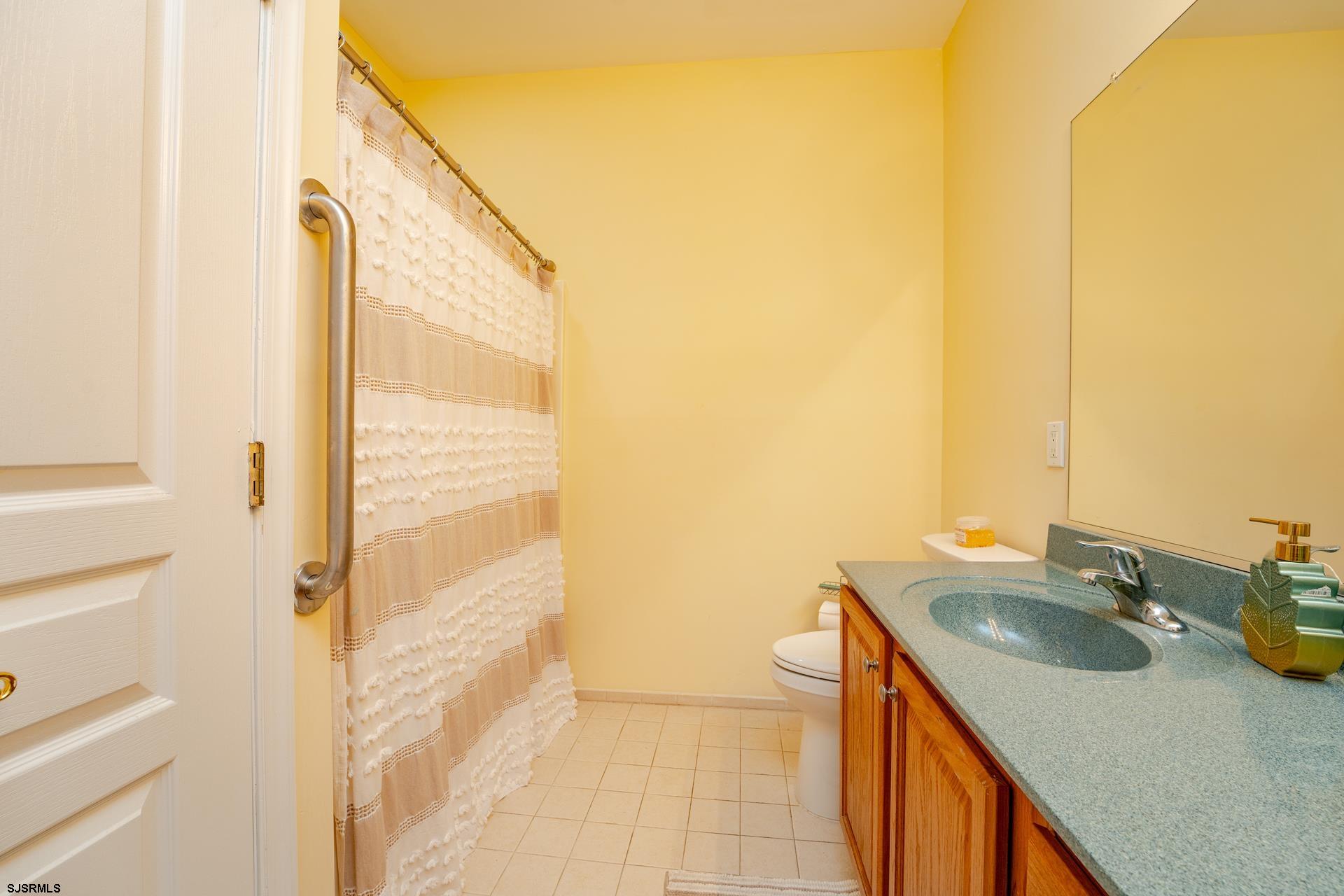1731 Highway 9, Unit 28 Ocean View, NJ 08230 - Photo 27 of 41 a bathroom with a sink and a mirror