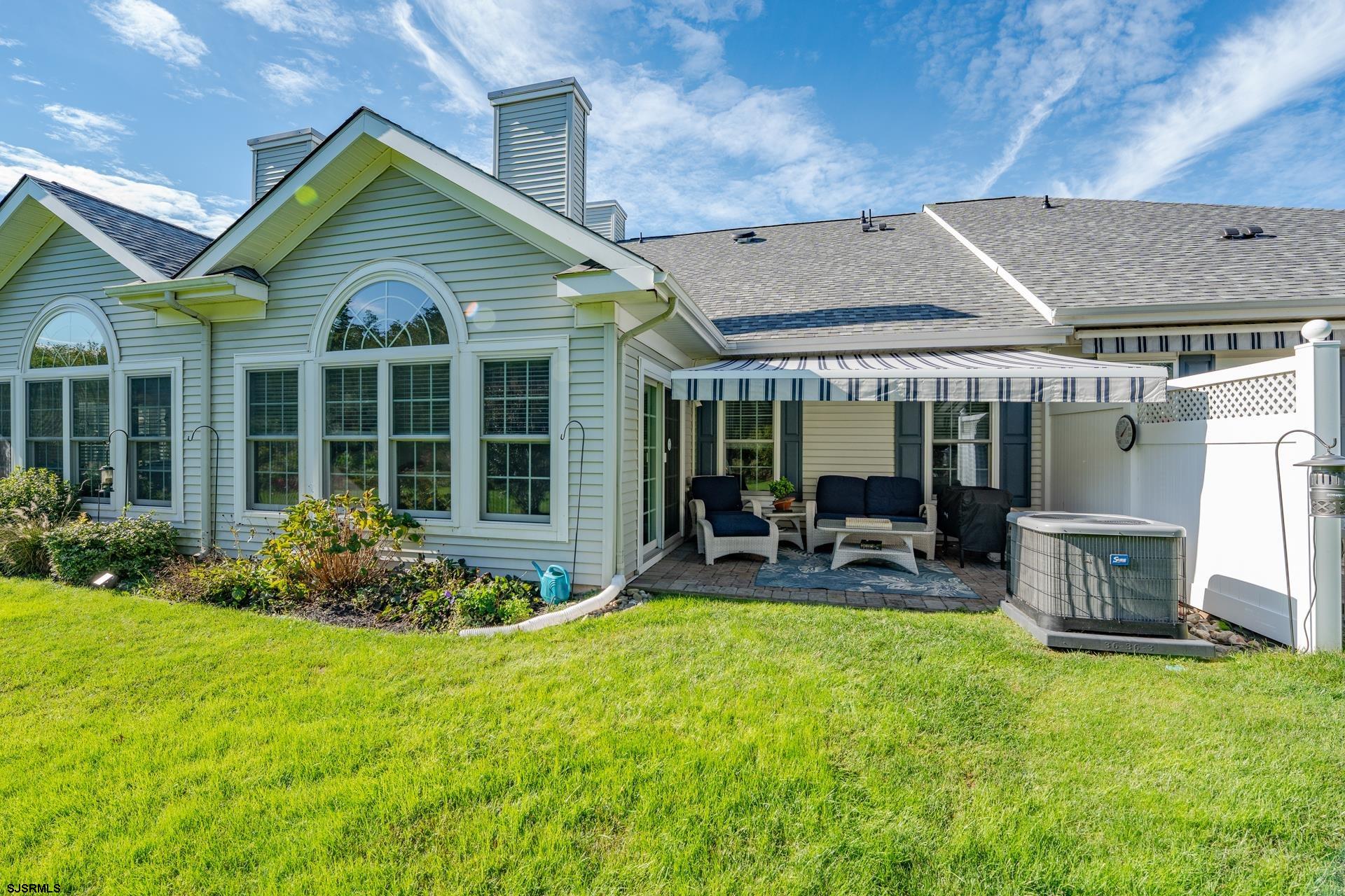 1731 Highway 9, Unit 28 Ocean View, NJ 08230 - Photo 33 of 41 a view of a house with sitting area and garden
