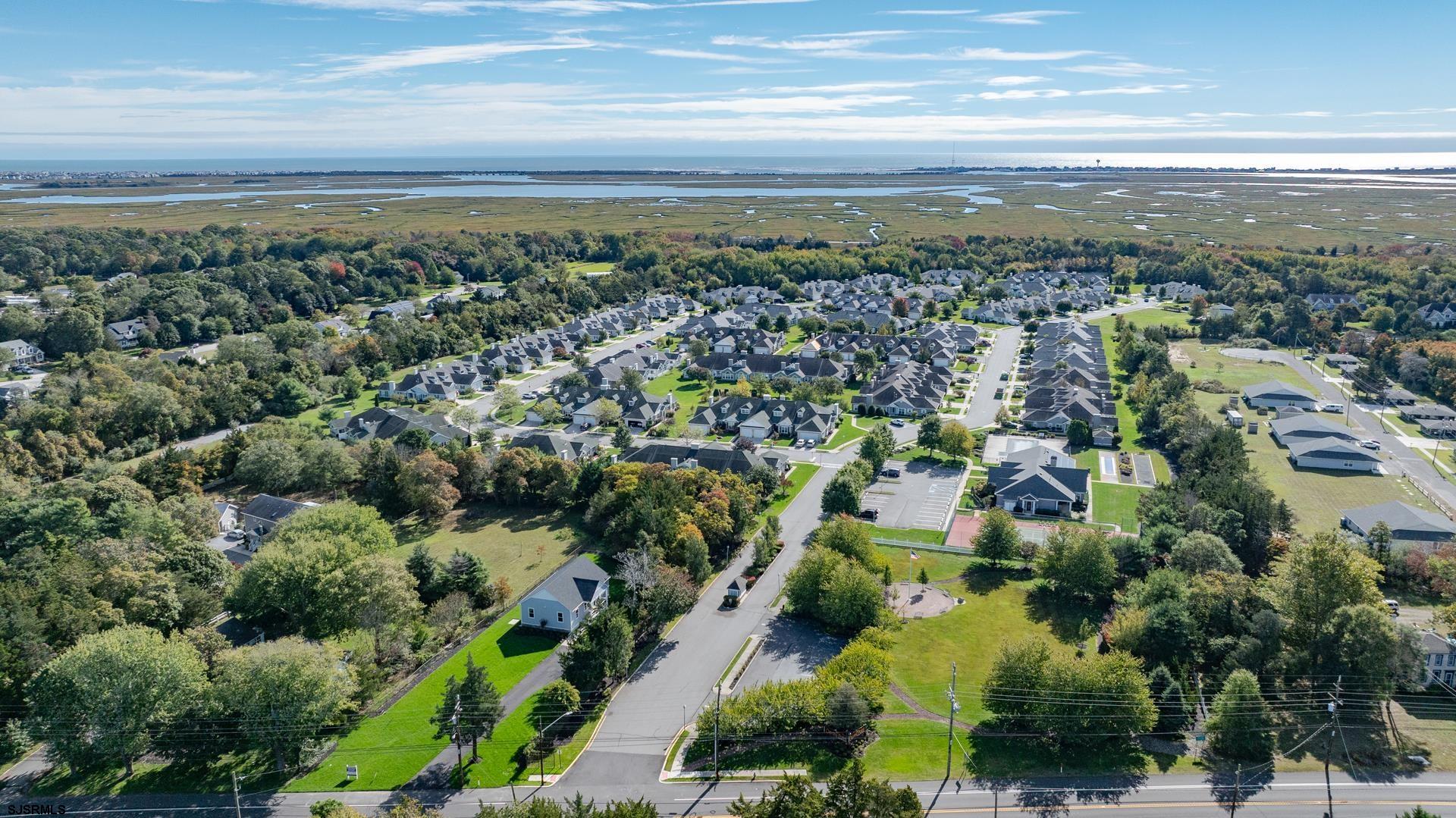 1731 Highway 9, Unit 28 Ocean View, NJ 08230 - Photo 38 of 41 an aerial view of residential building and green space