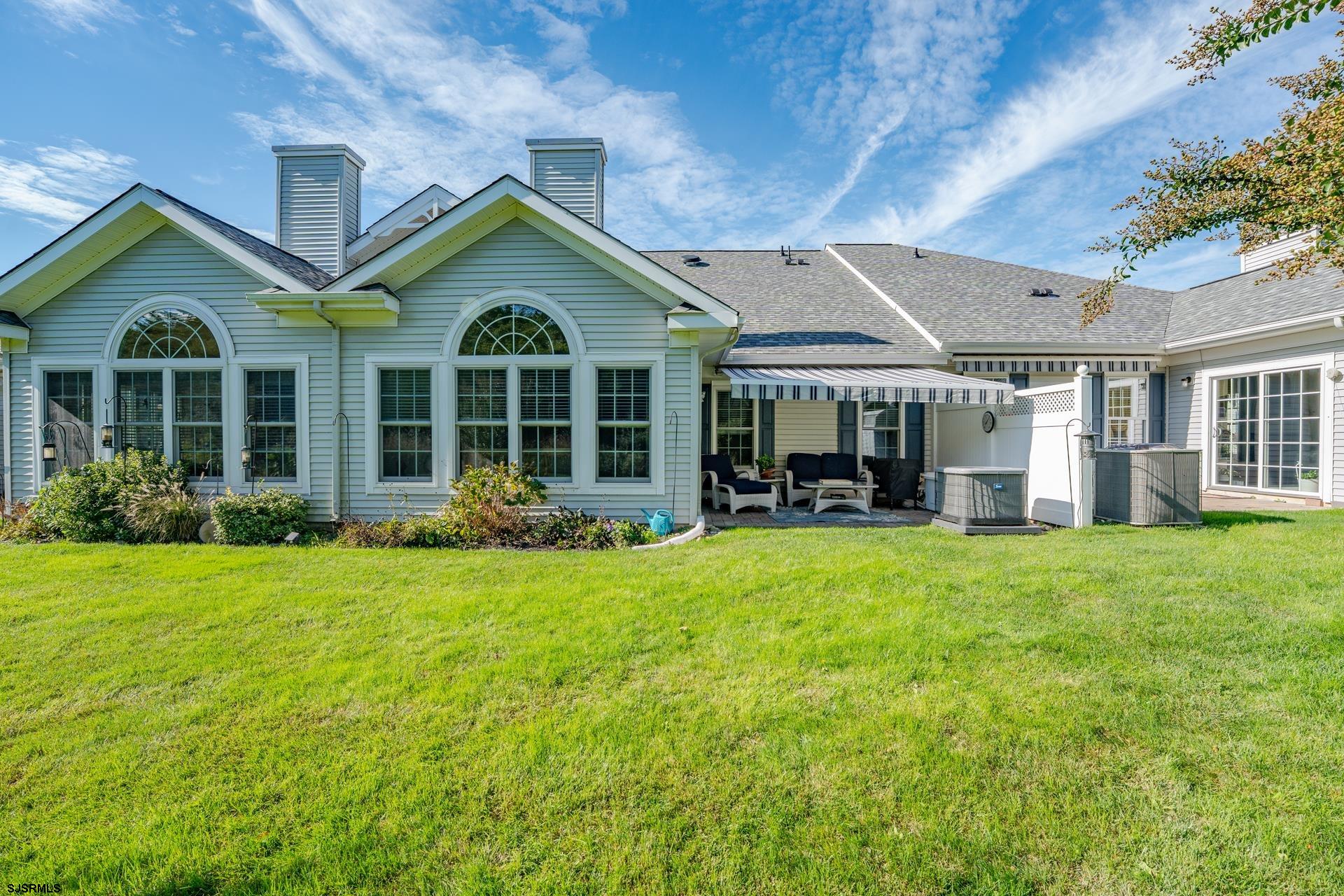 1731 Highway 9, Unit 28 Ocean View, NJ 08230 - Photo 4 of 41 a front view of a house with a garden and porch