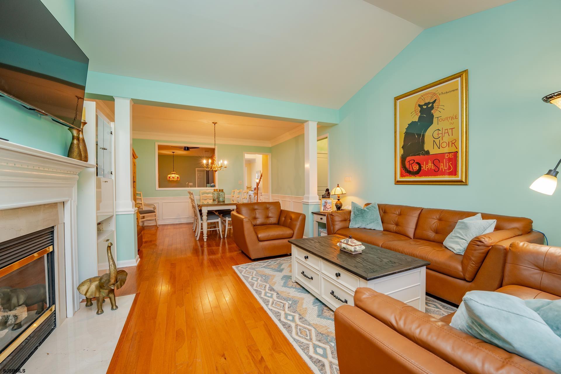 1731 Highway 9, Unit 28 Ocean View, NJ 08230 - Photo 10 of 41 a living room with furniture and a fireplace