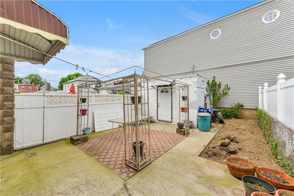 4203 Avenue I Brooklyn, NY 11210 - Photo 16 of 19 a view of a house with patio