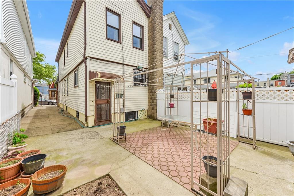 4203 Avenue I Brooklyn, NY 11210 - Photo 18 of 19 a view of a white building with many windows