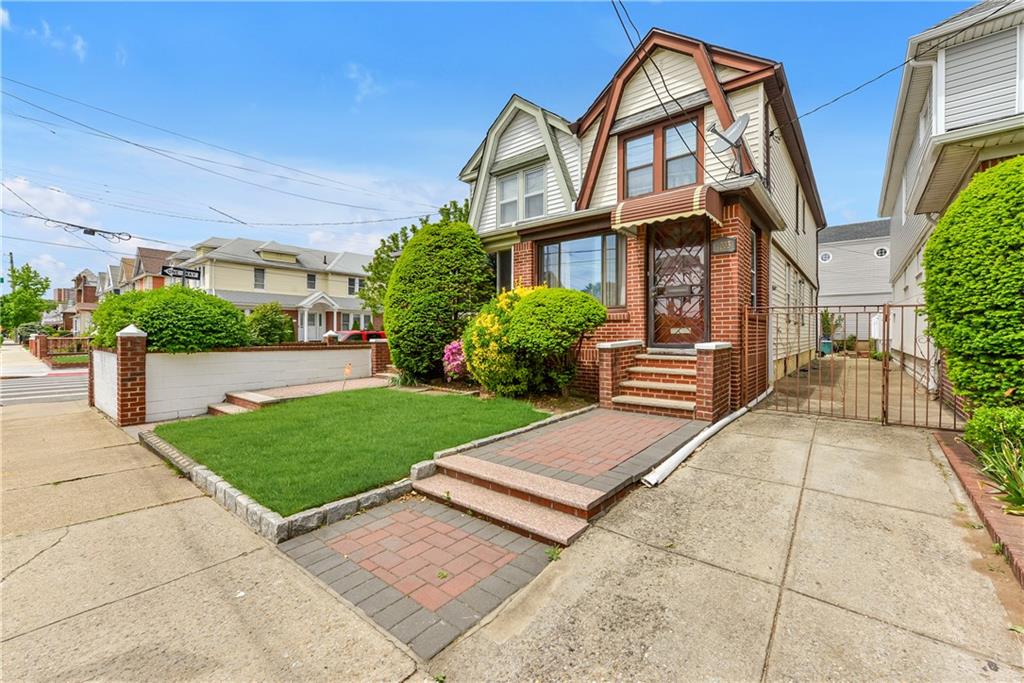 4203 Avenue I Brooklyn, NY 11210 - Photo 19 of 19 a front view of a house with garden
