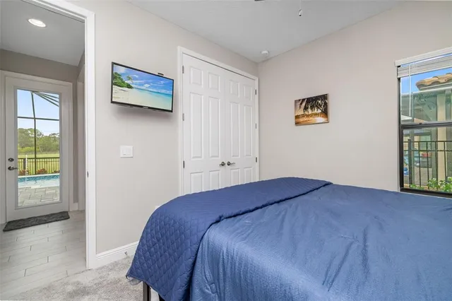a work room with furniture and a window