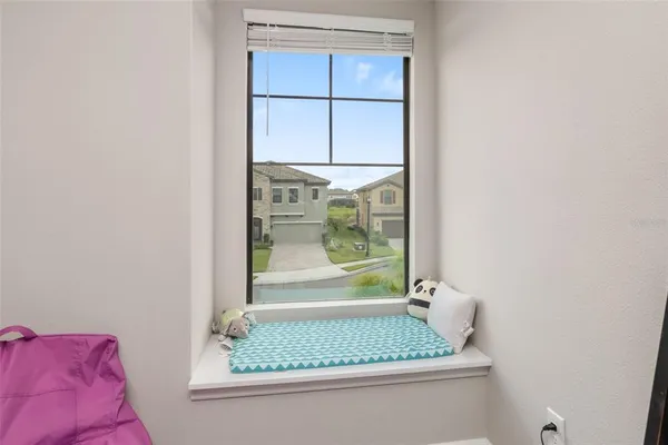 a bedroom with a bed and a toys