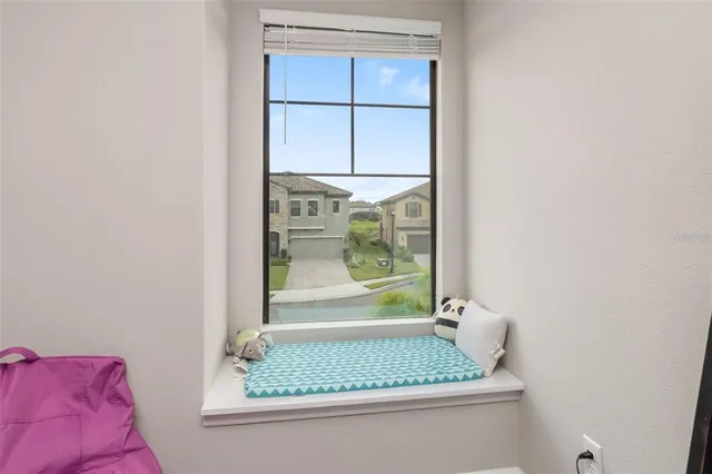 a bedroom with a bed and a toys