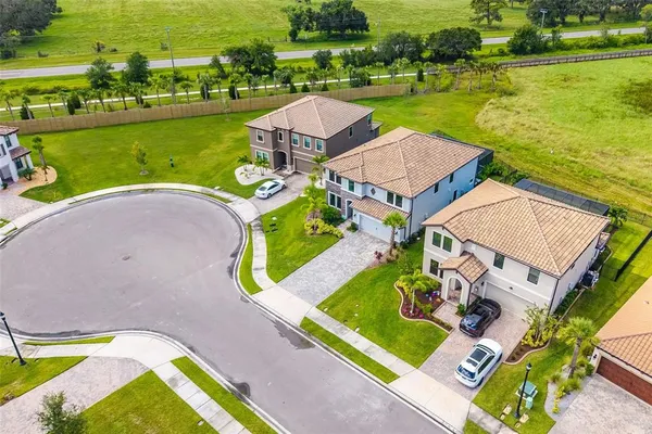 a view of a balcony with two chairs and a table