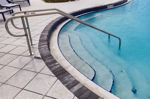 a view of a balcony with wooden floor