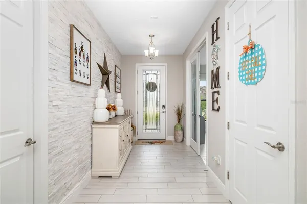 a kitchen with kitchen island granite countertop wooden cabinets and counter space