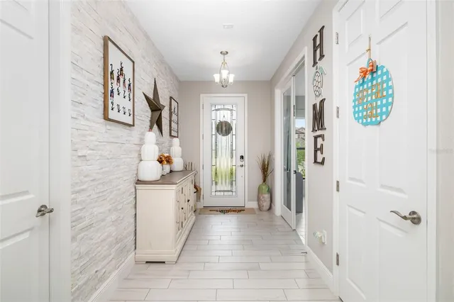 a kitchen with kitchen island granite countertop wooden cabinets and counter space