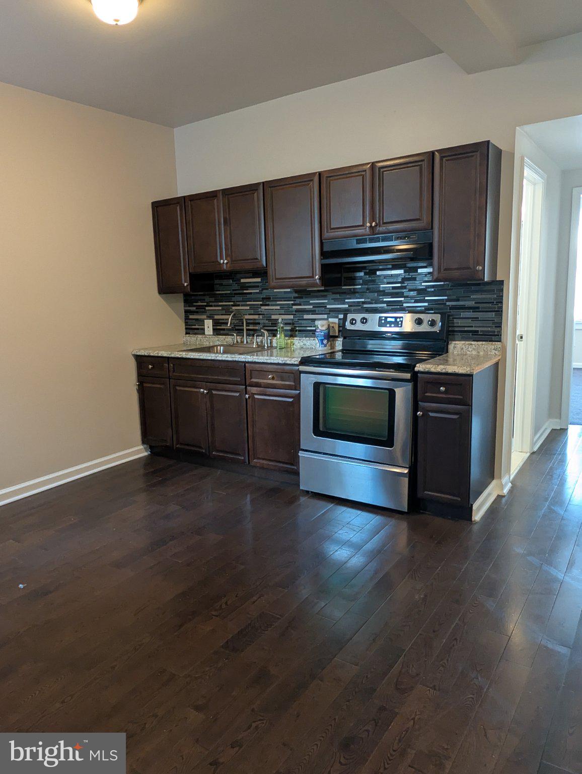 5933 Trinity Street Philadelphia, PA 19143 - Photo 15 of 21 Modern kitchen with sleek finishes.