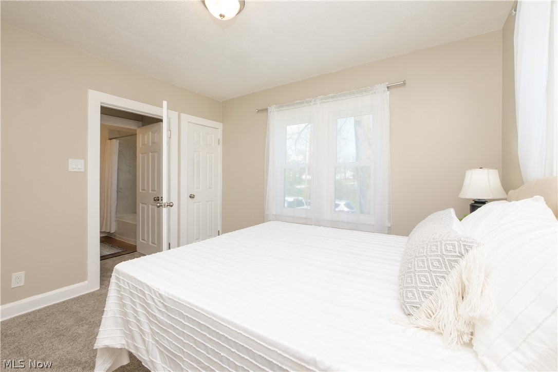 12379 Portage Street Rittman, OH 44270 - Photo 27 of 44 Bedroom featuring dark colored carpet