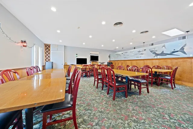 a view of a dining room with furniture