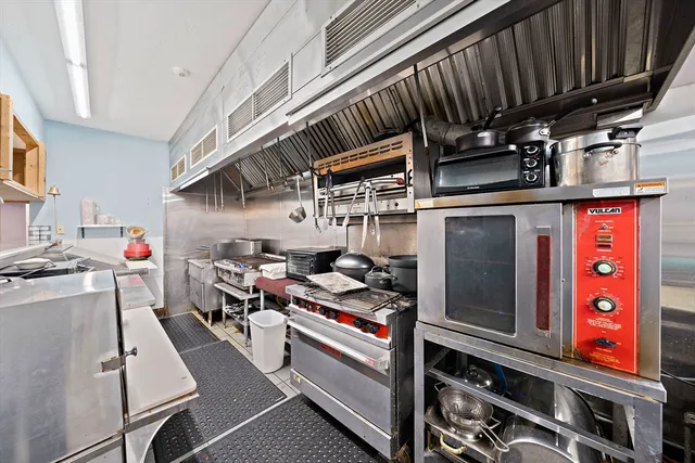 a storage room with washer and dryer