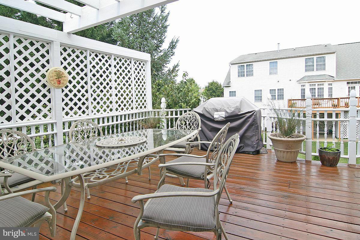2560 Bear Den Road Frederick, MD 21701 - Photo 15 of 30 a view of a chairs and table on the deck