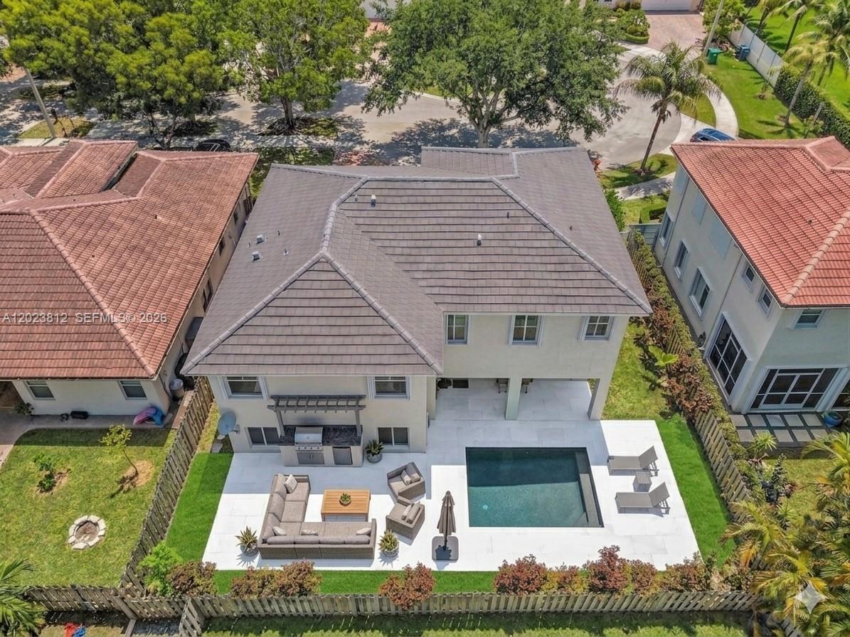 2864 Southwest 138th Path Miami, FL 33175 - Photo 5 of 40 an aerial view of a house with swimming pool