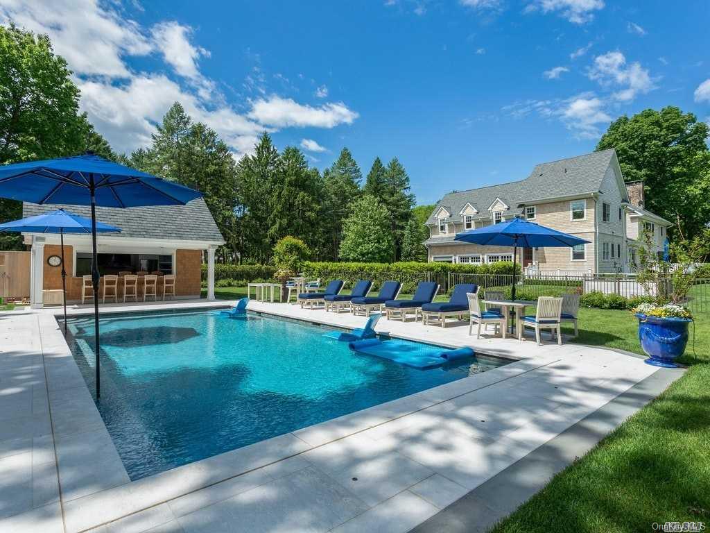 31 Bouton Road Lloyd Harbor, NY 11743 - Photo 1 of 1 a view of a swimming pool with a patio