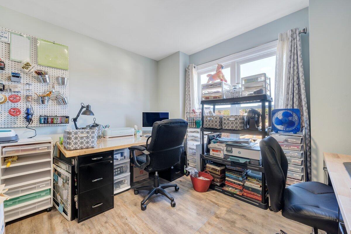 1685 Mountain View Road Vinton, VA 24179 - Photo 17 of 43 a view of a workspace with furniture and a window