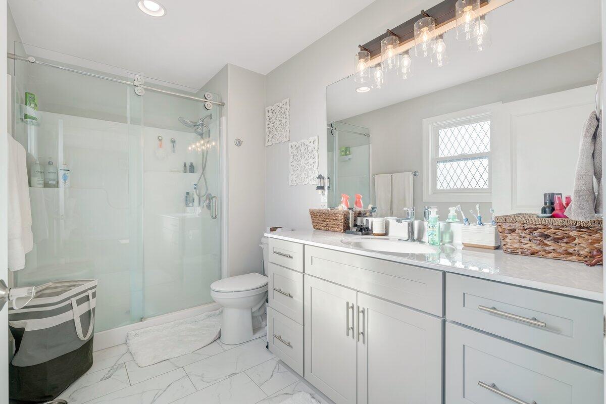 1685 Mountain View Road Vinton, VA 24179 - Photo 20 of 43 a bathroom with a sink a toilet and shower