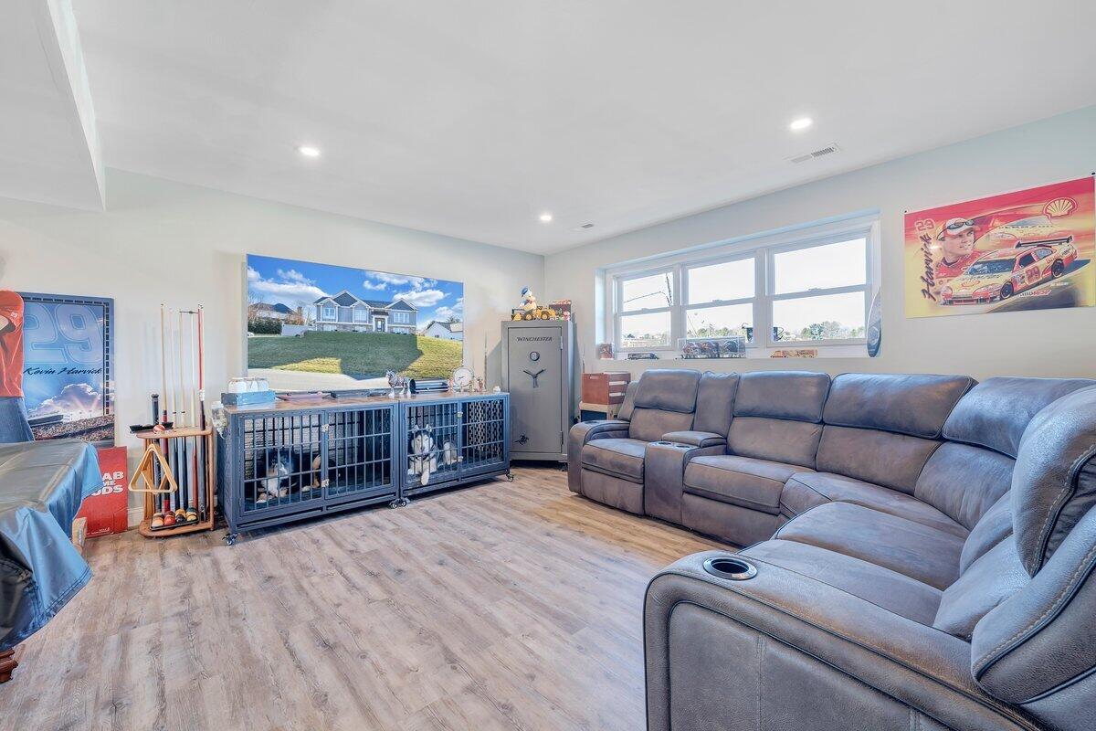 1685 Mountain View Road Vinton, VA 24179 - Photo 26 of 43 a living room with furniture and a flat screen tv