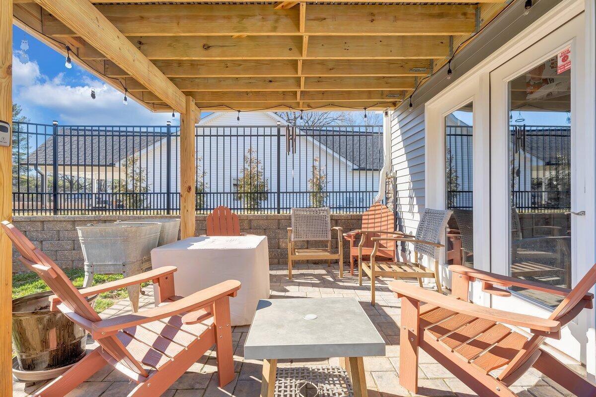 1685 Mountain View Road Vinton, VA 24179 - Photo 33 of 43 a view of a patio with couches chairs and wooden floor
