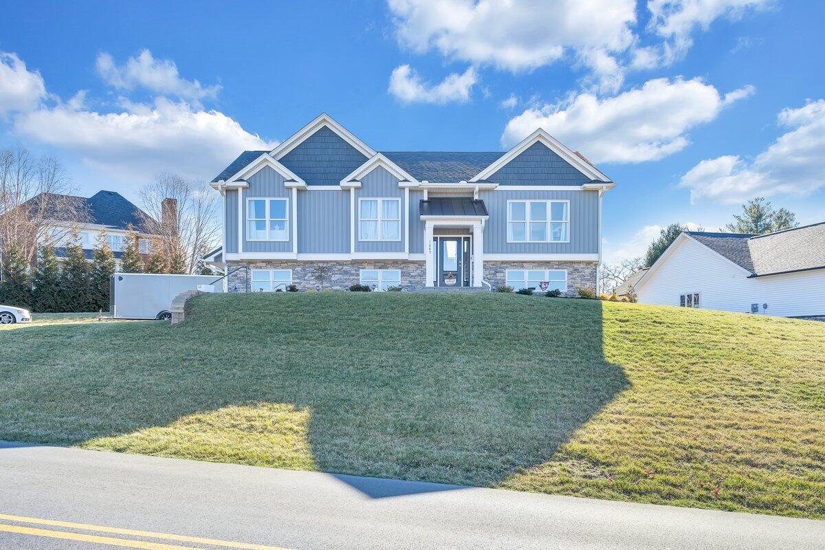 1685 Mountain View Road Vinton, VA 24179 - Photo 40 of 43 a front view of a house with a yard