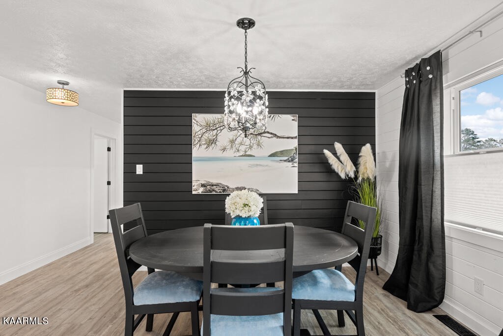 403 Wells Spring Road Dandridge, TN 37725 - Photo 7 of 24 a dining room with furniture and window