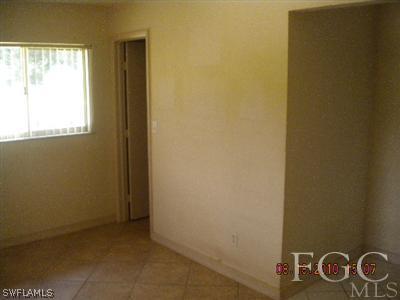 2308 Lotus Road Fort Myers, FL 33905 - Photo 4 of 8 a view of an empty room with windows