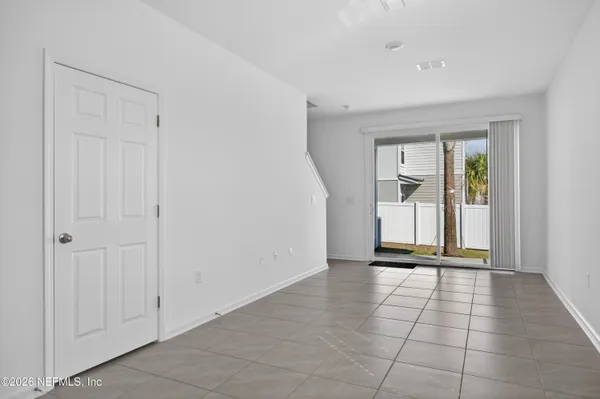 a bathroom with a sink toilet and a mirror