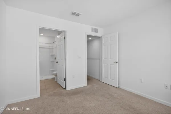 a bathroom with a sink toilet tub and shower