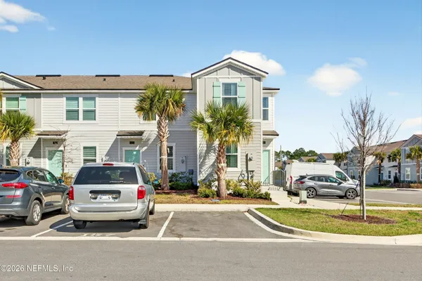 a car parked in front of a house