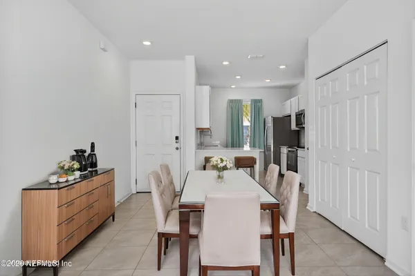 a view of a dining room with furniture