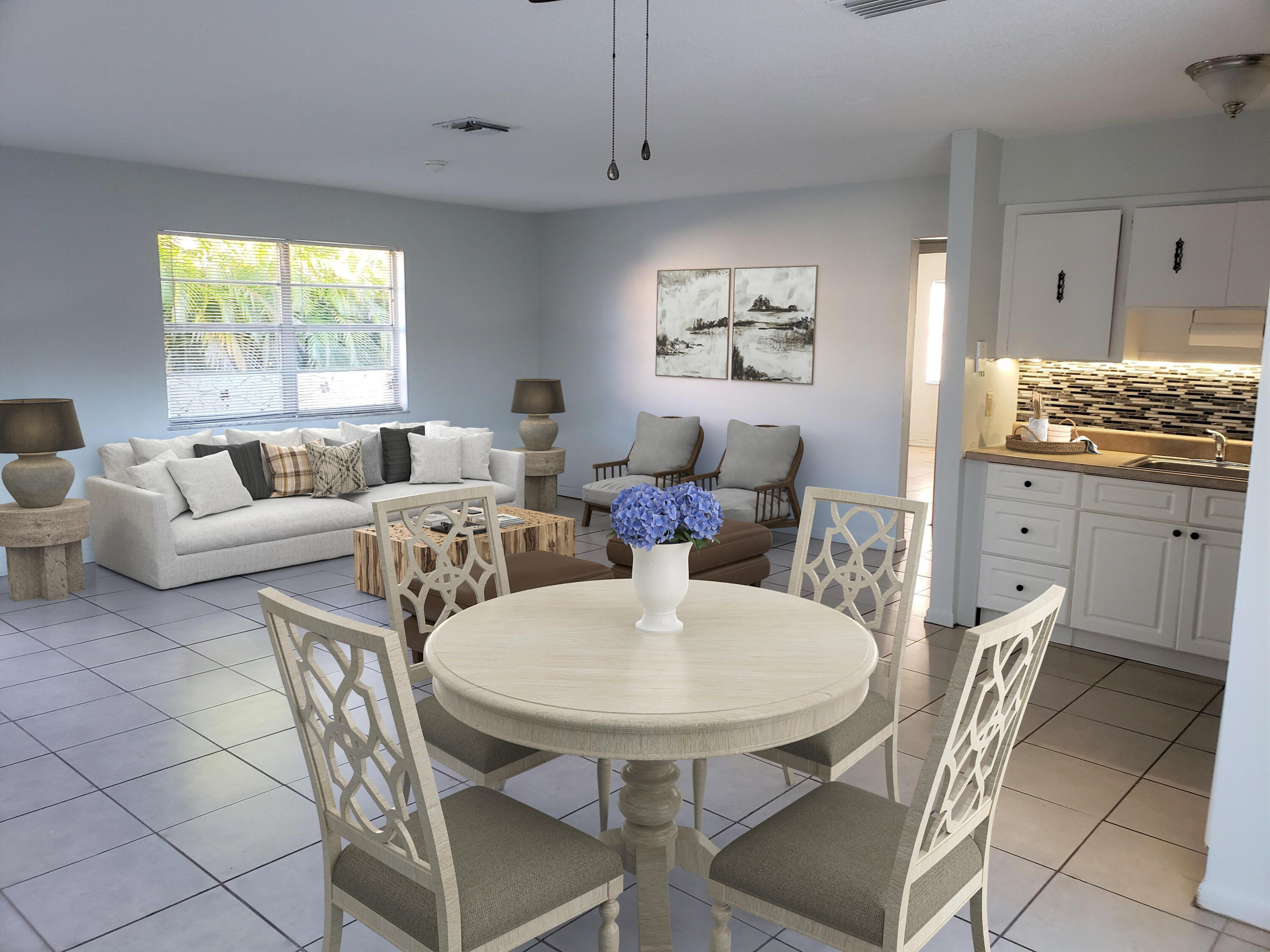 a living room with furniture and a window
