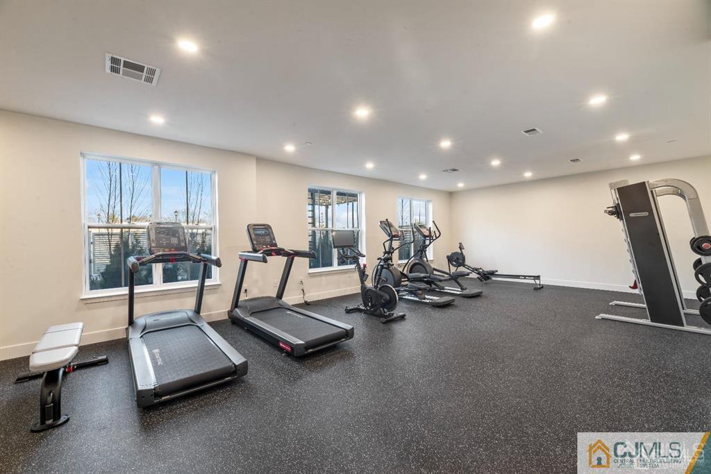 1 Nolan Way, Unit B32F North Brunswick, NJ 08902 - Photo 36 of 82 a view of a room with gym equipment
